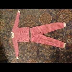 2 piece pink pajamas with small black hearts